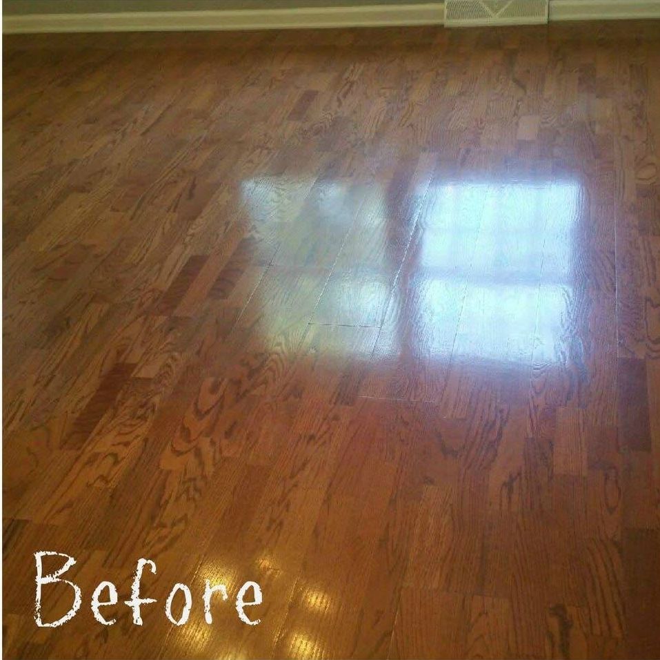 A hardwood floor before cleaning, dull and scuffed